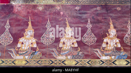 Wall murals depicting scenes from the Ramakien epic, Wat Mahathat, Phetchaburi, Thailand Stock Photo