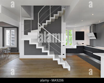 interior shots of a modern apartment overlooking on the kitchen and the dining room in foreground the staircase wjose floor is made of wood