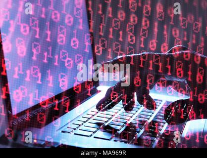 MODEL RELEASED. Cyber attack, conceptual image. Hacker accessing somebody else's computer programme. Stock Photo