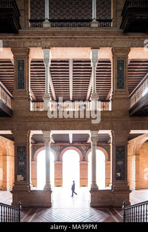 Visitors inside Plaza de España, Seville, Spain Stock Photo