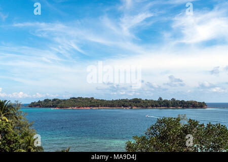 Ross island is the top view. A small island in the center of the ocean. on blue sky background and clouds