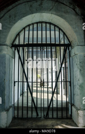 ancient dungeon. metal grill. Closed prison door. The concept of a prison, Gulag and political repressions Stock Photo