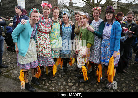 Heptonstall, UK. 30th March, 2018. Female Morris Dancers in Weavers Square on Good Friday in the historical village of Heptonstall, 30th March, 2018 (C)Barbara Cook/Alamy Live News Stock Photo