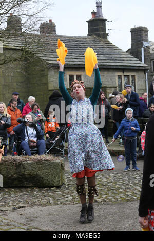 Heptonstall, UK. 30th March, 2018. Female Morris Dancers in Weavers Square on Good Friday in the historical village of Heptonstall, 30th March, 2018 (C)Barbara Cook/Alamy Live News Stock Photo