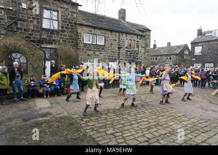 Heptonstall, UK. 30th March, 2018. Prior to the PACE EGG Play a  'Traditional ' Yorkshire dance of the Washerwomen ! A traditional Pace Egg play is performed in Heptonstall’s Weavers Square on Good Fridays, attracting hundreds of visitors to the village. Credit: Steve Morgan/Alamy Live News Stock Photo