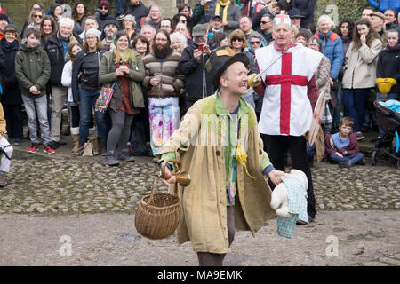 Heptonstall, UK. 30th March, 2018. A traditional Pace Egg play is performed in Heptonstall’s Weavers Square on Good Fridays, attracting hundreds of visitors to the village. The origins are uncertain, but some version of the plays have undoubtedly been performed over many hundreds of years. In the play St George takes on contenders such as Bold Slasher, the Black Prince of Paradine and Hector. Credit: Steve Morgan/Alamy Live News Stock Photo