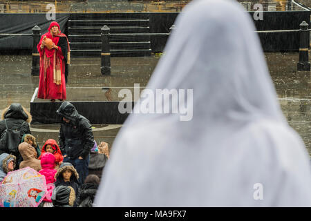 London, UK. 30th March, 2018.Jesus is resurected - The Wintershall Players open-air re-enactment of 'The Passion of Jesus' on Good Friday in the rain in Trafalgar Square. It featured a cast of over 100 volunteers from in and around London. Credit: Guy Bell/Alamy Live News Stock Photo