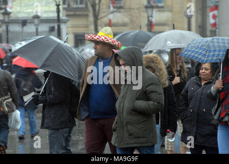 London, UK, 30 March 2018 Crowds brave rain to watch The Passion of Jesus in Trafalgar Square. Credit: JOHNNY ARMSTEAD/Alamy Live News Stock Photo