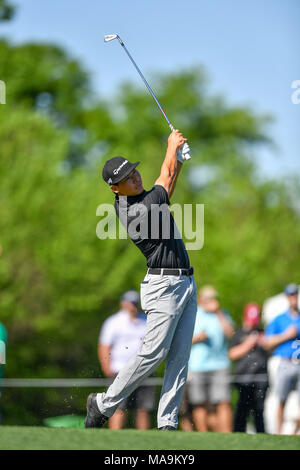 Humble, Texas, USA. 30th Mar, 2018. Xinjun Zhang tees off during the Houston Open at the Golf Club of Houston in Humble, Texas. Chris Brown/CSM/Alamy Live News Stock Photo