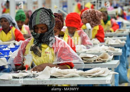 Beijing, Ethiopia. 19th July, 2017. A laborer works at Huajian factory ...