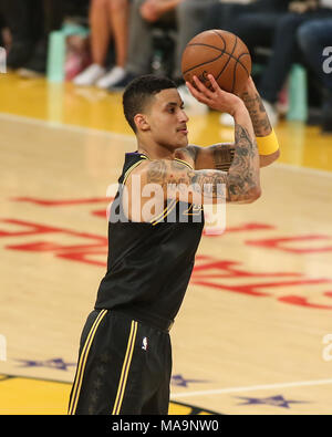 Milwaukee Bucks forward Kyle Kuzma (18) shoots over Indiana Pacers
