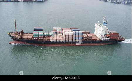 Hong Kong, New Territories, Hong Kong. 30th Mar, 2018. Aerial view of container ship at Hong Kong docks terminal.The Hong Kong Container Terminals is the sixth busiest container port in the world. It handled over 20 million TEUs in 2017. Credit: Miguel Candela/SOPA Images/ZUMA Wire/Alamy Live News Stock Photo