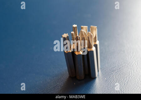 Head for screwdriver (bits) on blue background, Tools collection turn-screw Stock Photo
