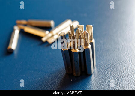 Head for screwdriver (bits) on blue background, Tools collection turn-screw Stock Photo