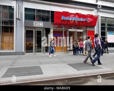 People walk past the Bank of America branch near Penn Station in Times Square, New York City, New York, September 15, 2017. () Stock Photo