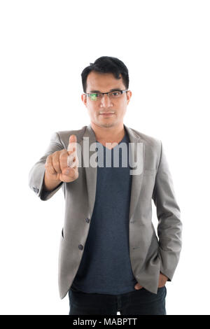 Portrait of businessman touching an imaginary screen against white background Stock Photo