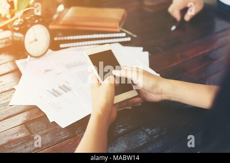 Close-up shot of an analytical team working with the latest financial results, Office life concept. Stock Photo