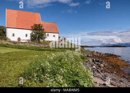 Trondenes Church in Harstad is the northernmost medieval stone church of Norway and the world's northernmost surviving medieval building. Stock Photo