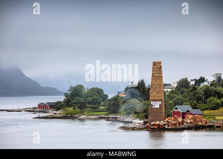 A pallet tower by the waterfront at Alesund Harbour, Norway. Stock Photo