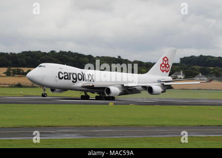 LX-ECV, a Boeing 747-4HQF operated by Cargolux Airlines, arriving at Prestwick International Airport in Ayrshire. Stock Photo