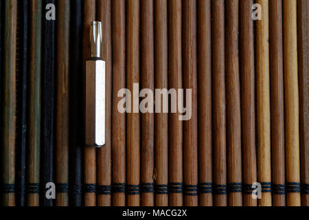 Head for screwdriver (bits) on wooden background, Tools collection turn-screw Stock Photo