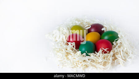Colored easter eggs isolated on white background, place for text. Stock Photo