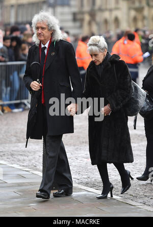 Brian May and Anita Dobson arrive for the funeral service of Professor Stephen Hawking at University Church of St Mary the Great in Cambridge. Stock Photo