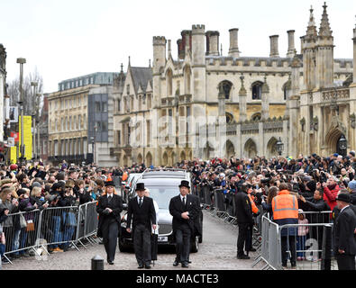 The hearse containing Professor Stephen Hawking arrives at University Church of St Mary the Great in Cambridge, as mourners look on. Stock Photo