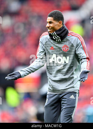 Manchester United's Marcus Rashford warms up during the Premier League match at Old Trafford, Manchester. Stock Photo