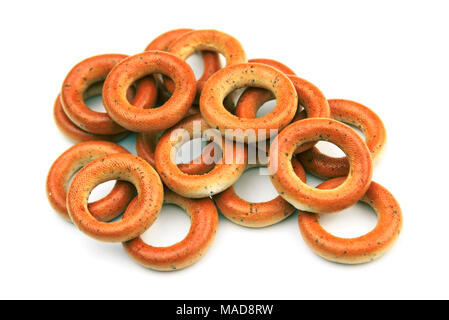 Fresh baked bagels. Bagel breakfast on isolated white background. Diet snack food. Stock Photo