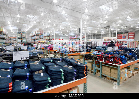 Costco Wholesale membership warehouse store interior, jeans at the mens clothing section. British Columbia, Canada 2017. Stock Photo