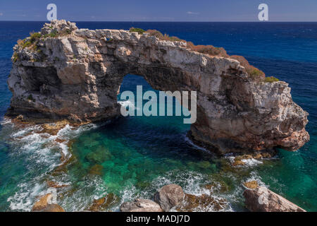 Rock arch on the Mediterranean coast of Mallorca at Santanyi on a sunny summer's day Stock Photo