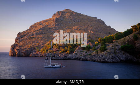 Solitary yacht on the Mediterranean Sea off the coast of Mallorca at sa Calobra Stock Photo
