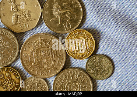 British identity and nostalgia for the past. Coins from the pre decimal and early decimal eras including half crown and two shilling pieces. Stock Photo