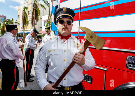 Miami Beach Florida,Veterans Day,parade staging area,Miami Beach,Fire Department,firefighter,formal uniform,ax,man men male,FL171117010 Stock Photo