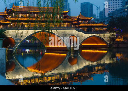 Night view of Anshun Bridge with reflection in Jin River, Chengdu, Sichuan Province, China Stock Photo