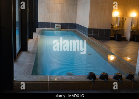 Outdoor onsen at the Candeo Hotel in Osaka Stock Photo