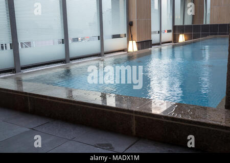 Outdoor onsen at the Candeo Hotel in Osaka Stock Photo