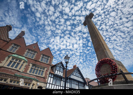 Arundel High Street and war memorial taken during July. A mackerel sky with rows of small white fleecy clouds. West Sussex UK. Stock Photo