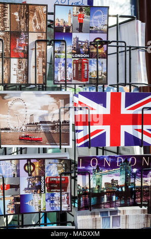 British Tourist postcards in a rack in London Stock Photo