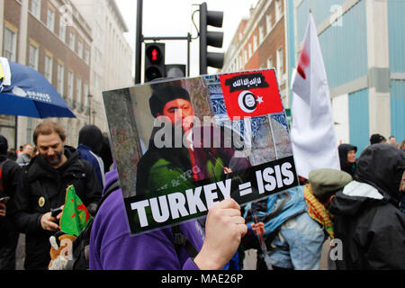 London, UK, 31 Mar 2018. Protester compares the Turkish Army to ISIS Credit: Alex Cavendish/Alamy Live News Stock Photo