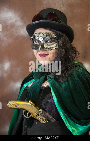 Manchester, UK, 31st March 2018. TimeQuake Steampunk Festival,  Weekend at the Asylum, the Planet’s largest steampunk festival where a City becomes Wasteland Costumes Capital for four days. The Victorian Steampunk Society, teamed up with Manchester’s Bowlers Exhibition Centre and the organisers of For the Love of Sci Fi to create create a masquerade, fantasy carnival cosplay Expo. Credit: MediaWorldImages/AlamyLiveNews Stock Photo