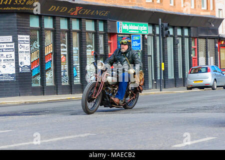 Glasgow, Scotland, UK. 1st April, 2018. Over 1000 bikers, many wearing a colourful costume, from all over Scotland meet in Glasgow for the annual Easter Egg Run from Glasgow Green to The Royal Hospital For Children to raise funds for Glasgow Children's Hospital Charity. Pictured biker riding an Indian motorcycle. Credit: Skully/Alamy Live News Stock Photo