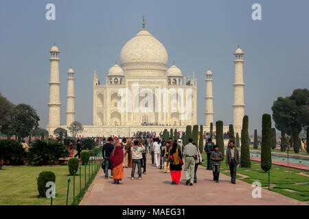 Tourists visiting Taj Mahal complex in Agra, Uttar Pradesh, India. Taj Mahal was designated as a UNESCO World Heritage Site in 1983. Stock Photo