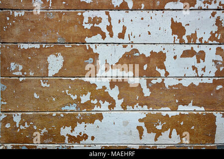 detailed texture of damaged plaster on old house wall Stock Photo
