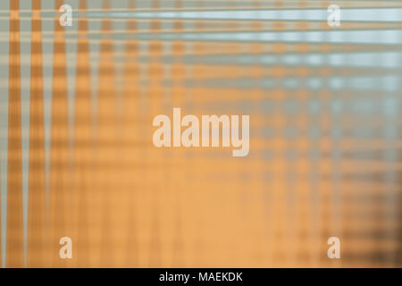 Abstract brown background with grid of silver or gray stripes Stock Photo