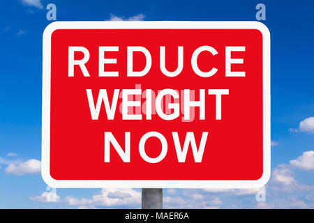Red and white warning sign REDUCE WEIGHT NOW in front of blue sky, symbol for the health risks or dangers of overweight Stock Photo