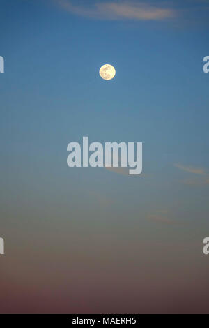 Full moon rising over Antalya, Turkey, springtime equinox, Stock Photo