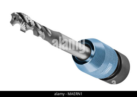 Spiral flute tap clamped in chuck. Isolated on white background. Close-up of decorative steel tool for threading. Idea of metalworking and engineering. Stock Photo