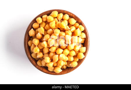 Wooden bowl of preserved (boiled) chickpeas isolated on white background Stock Photo